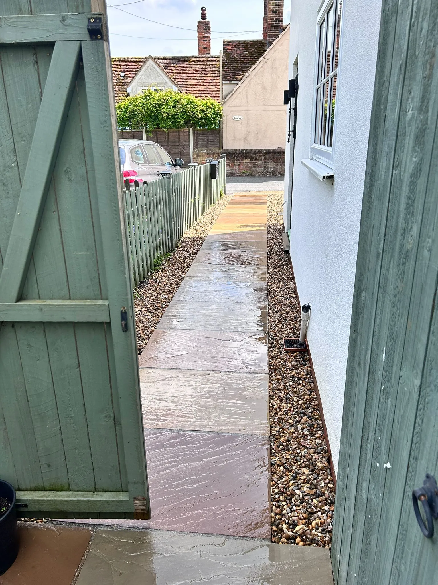 Green fencing with a path